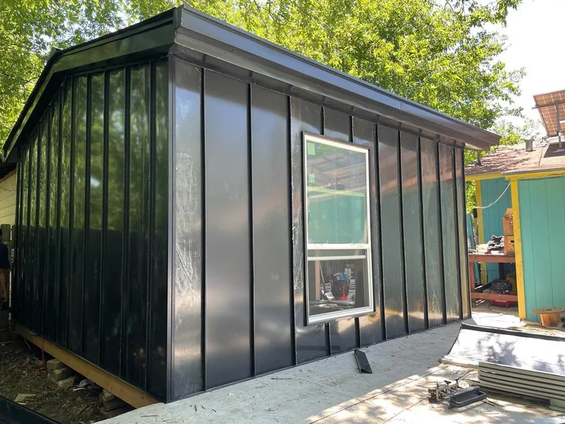 Black standing seam metal wall panels for Metal Roof Installation in West Athens