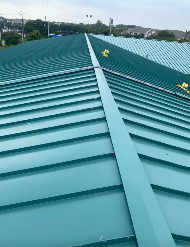 Green commercial metal roof ridge and valley for Metal Roof Repair in West Athens